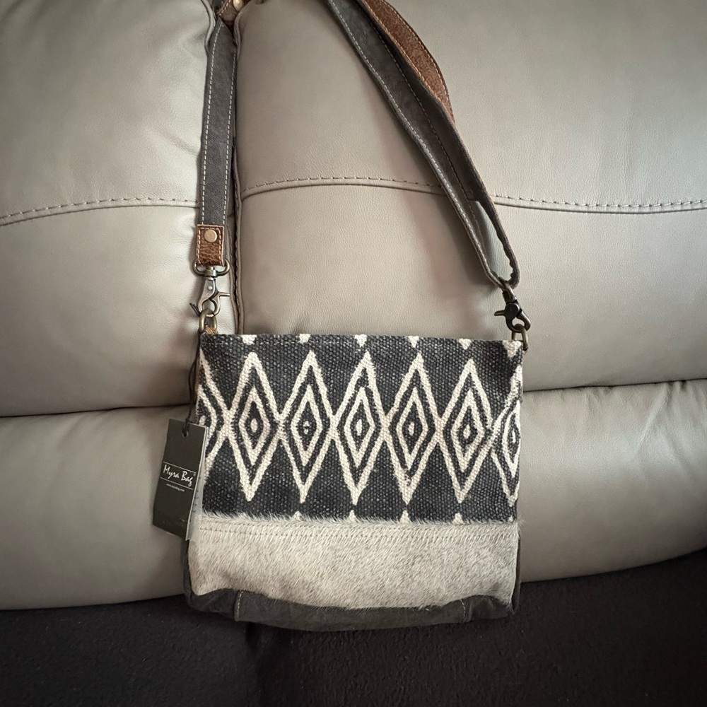 Myra Bag Black and White Crossbody Bag with Geometric Pattern.